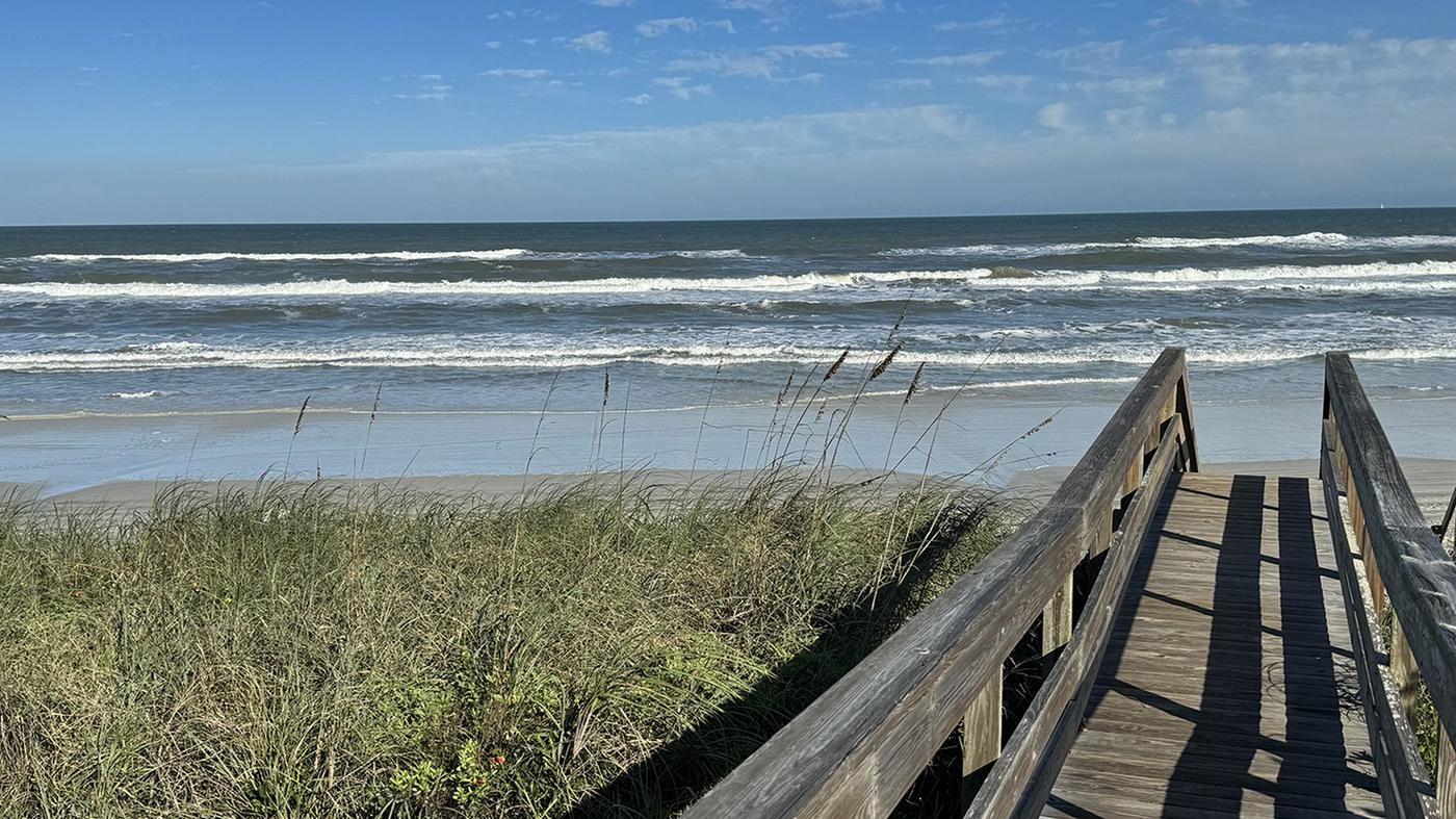 Boardwalk through the sea oats to the beach at Crescent Beach